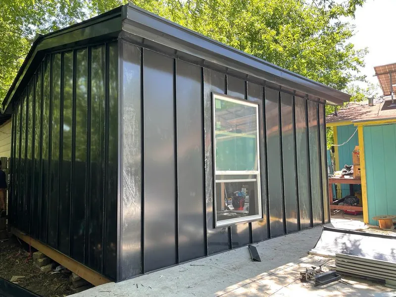 Black standing seam metal wall panels for Roof Inspection in Mukilteo