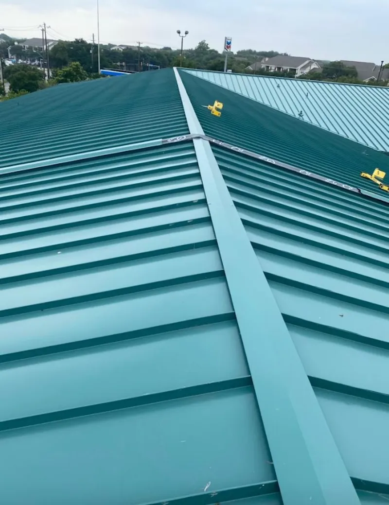 Green commercial metal roof ridge and valley for Metal Roof Repair in Mukilteo